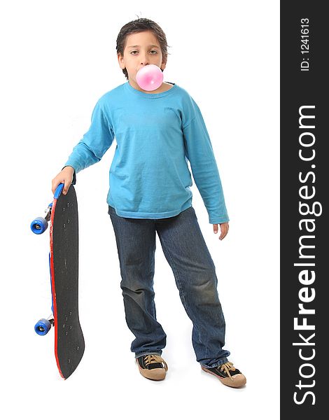 Boy blowing a bubble gum holding a skate