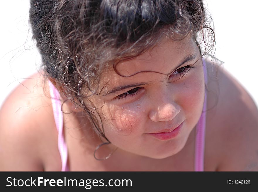 Child laying on beach and looking to the sea. Child laying on beach and looking to the sea