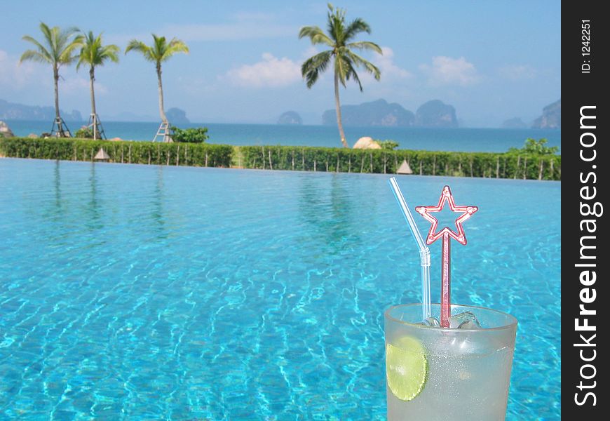 Refreshing drink at the poolside. Refreshing drink at the poolside...