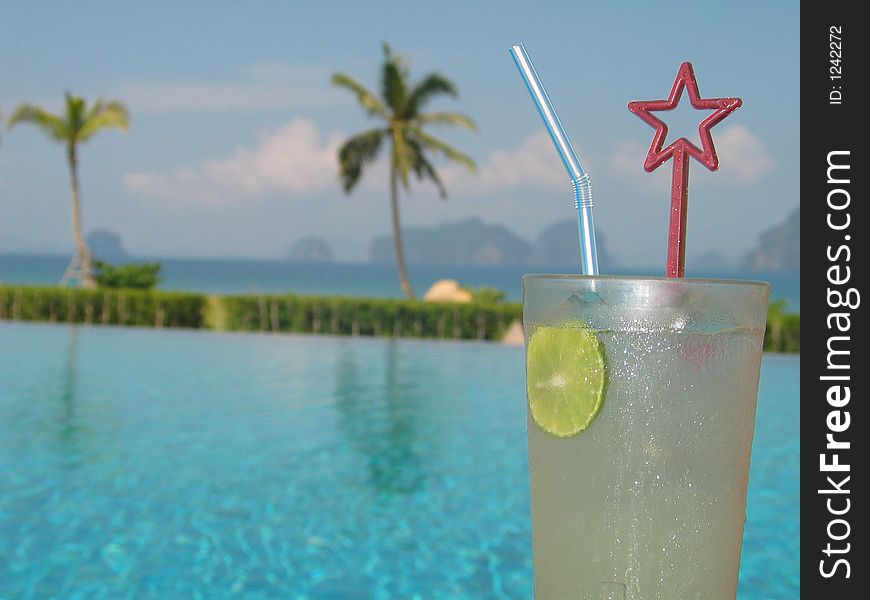 Refreshing drink at the poolside. Refreshing drink at the poolside...