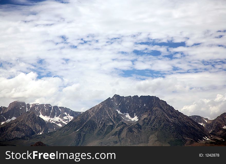 Mountains with snow and beautiful clouds. Mountains with snow and beautiful clouds