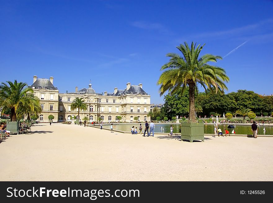 Green park and old building, Paris France