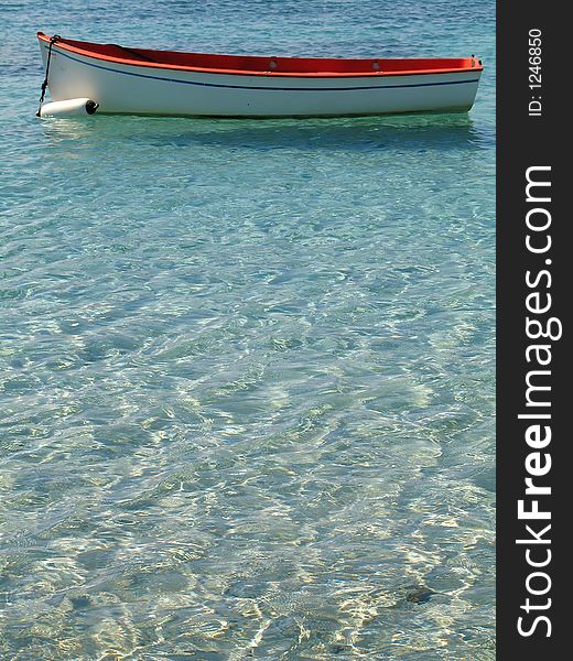 A boat on a wonderful beach in 
Italy. A boat on a wonderful beach in 
Italy