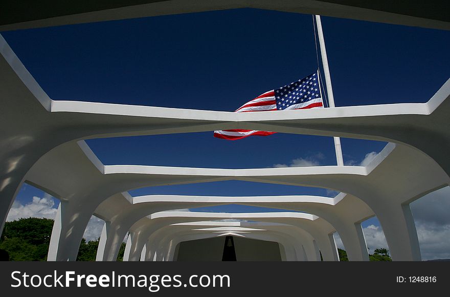 The flag above the Arizona Memorial. The flag above the Arizona Memorial.