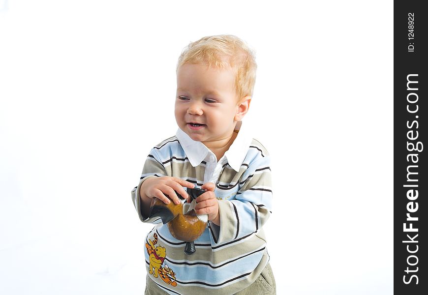 Little boy with toy. Studio shot. Little boy with toy. Studio shot.