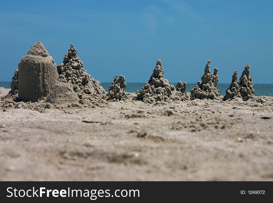 A 'dripy' sandcastle at the beach