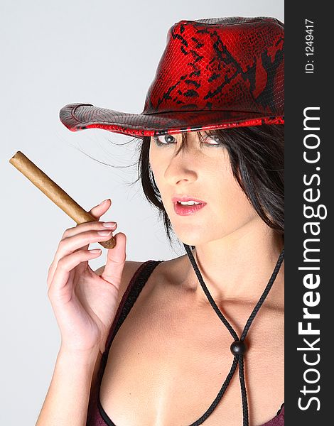 Cowboy woman smoking cigar