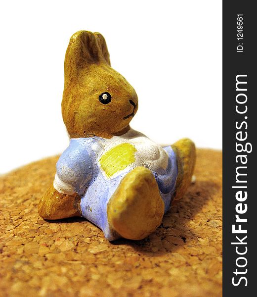 Small ceramic bunny toy, sitting. Small ceramic bunny toy, sitting