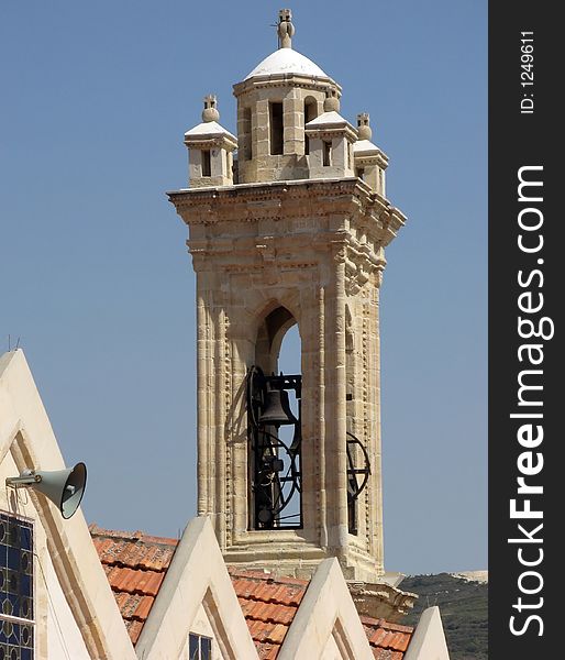 A steeple on an old church in Omodos, Cyprus. A steeple on an old church in Omodos, Cyprus