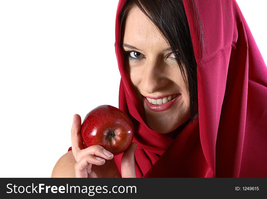 Woman with red scarf eating a red apple. Woman with red scarf eating a red apple