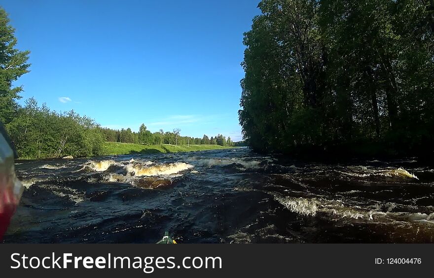 River rafting kayaking. Overcoming water rapids by boat. Rowing paired paddle. Extreme sports. Water sports. Shooting Action camera. Full HD