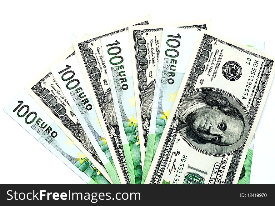 Hundreds of dollars and euro a white background