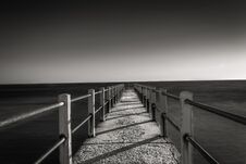 Black And White Photo Of Jetty At Sunset Royalty Free Stock Images