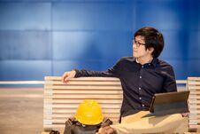 Asian Engineer Man Using Digital Tablet On Bench Royalty Free Stock Images Asian Engineer Man Using Digital Tablet On Bench Royalty Free Stock Images