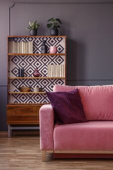 Red Pillow On Pink Couch In Retro Living Room Interior With Wood Royalty Free Stock Photo Red Pillow On Pink Couch In Retro Living Room Interior With Wood Royalty Free Stock Photo