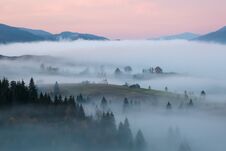 Scenery Of The Sunrise At The High Mountains. Dense Fog With Beautiful Light. A Place To Relax In The Carpathian Park. Stock Photography Scenery Of The Sunrise At The High Mountains. Dense Fog With Beautiful Light. A Place To Relax In The Carpathian Park. Stock Photography