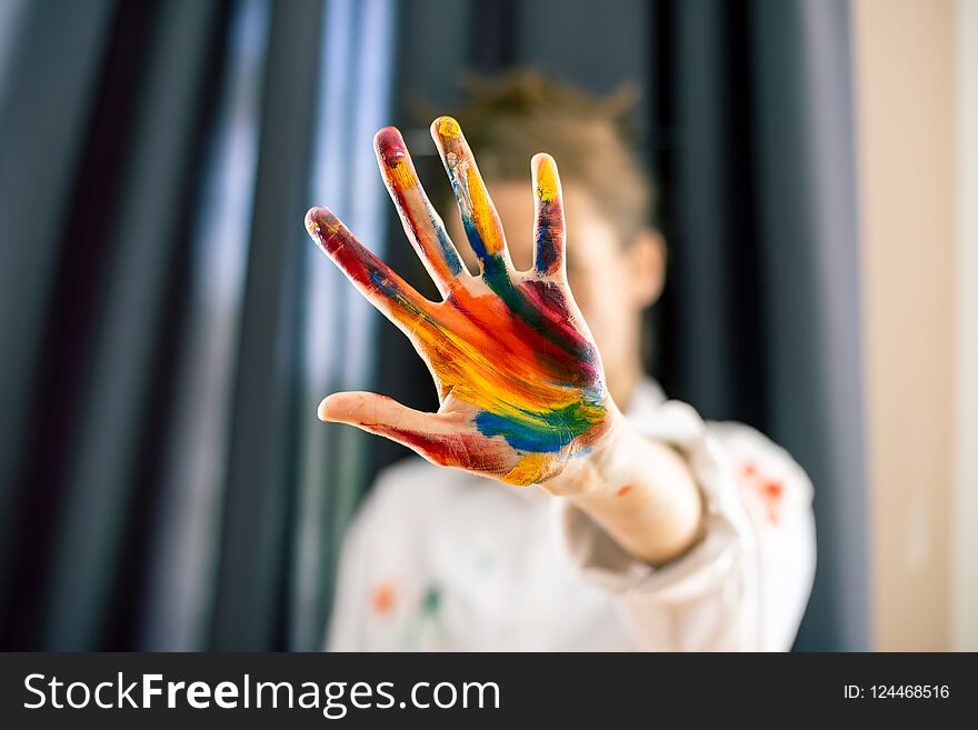 Woman Showing Stop Gesture, Hand Painted In Colorful Paints