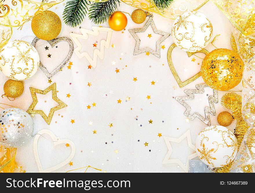Abstract christmas decor in gold and white caves with christmas toys and decor. Abstract christmas decor in gold and white caves with christmas toys and decor