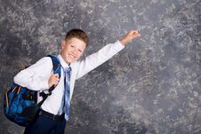 Boy In A White Shirt And Tie With A Backpack Stock Photos