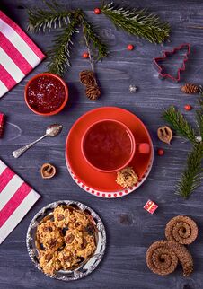Raspberry Tea, Raspberry Jam And Homemade Cookies On A Dark Background. Top View Stock Photo