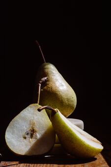 Ripe Pears On Dark Background Stock Photos