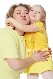 Mom And Little Daughter Plus The Size Of The Model, Gently Embra Stock Photos