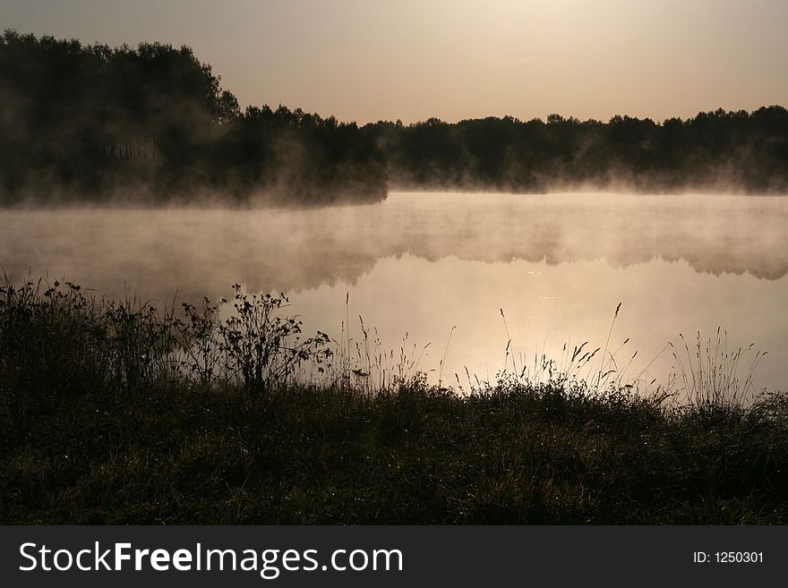 Early morning fog on lake