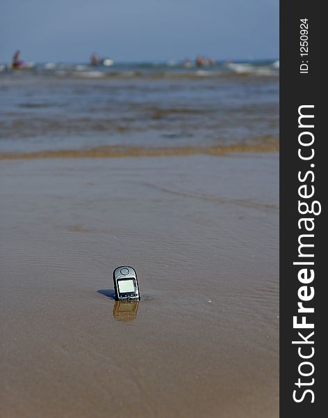 Mobile-phone left on the beach. Mobile-phone left on the beach