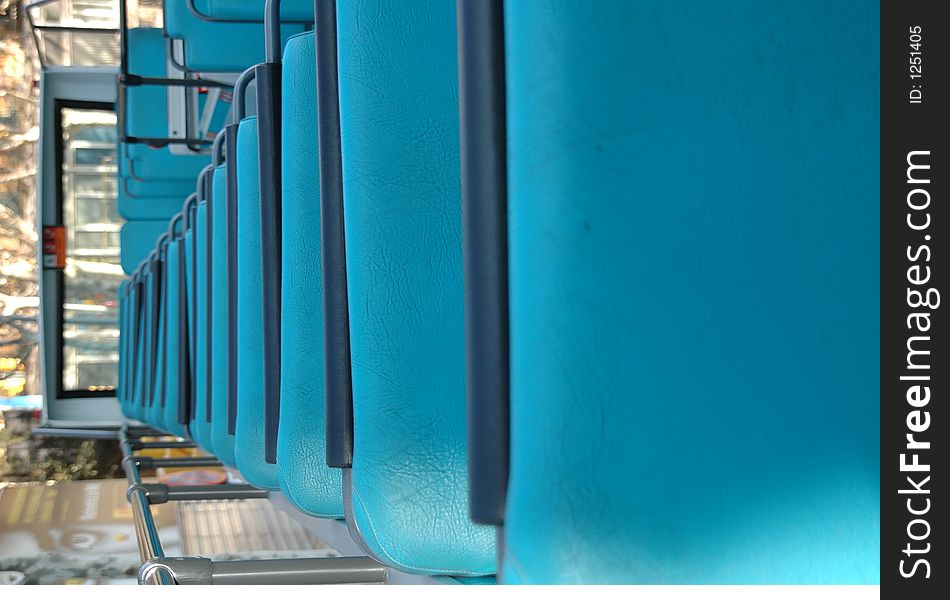 Empty blue seats on the upper deck of a bus. Empty blue seats on the upper deck of a bus