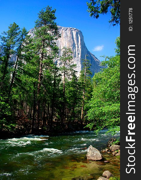 El Capitan is a 3,000 foot vertical rock formation in Yosemite Valley and Yosemite National Park. It is one of the most popular monoliths with rock climbers in the world. El Capitan is a 3,000 foot vertical rock formation in Yosemite Valley and Yosemite National Park. It is one of the most popular monoliths with rock climbers in the world.