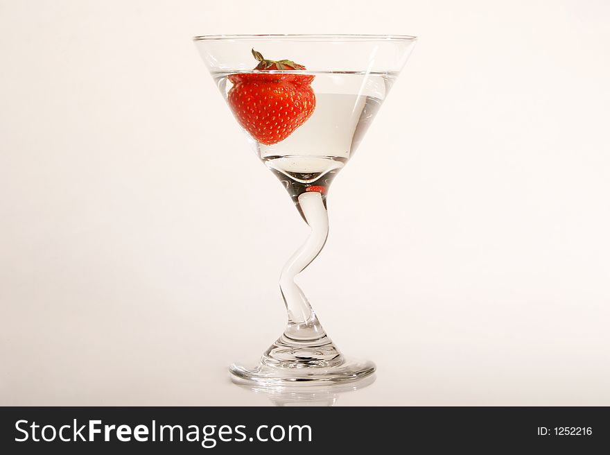 Strawberry Martini with strawberry dropped in