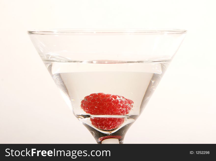 Raspberry Martini with raspberry dropped in
