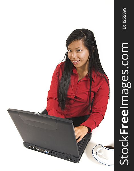 Receptionist smiling with laptop over white