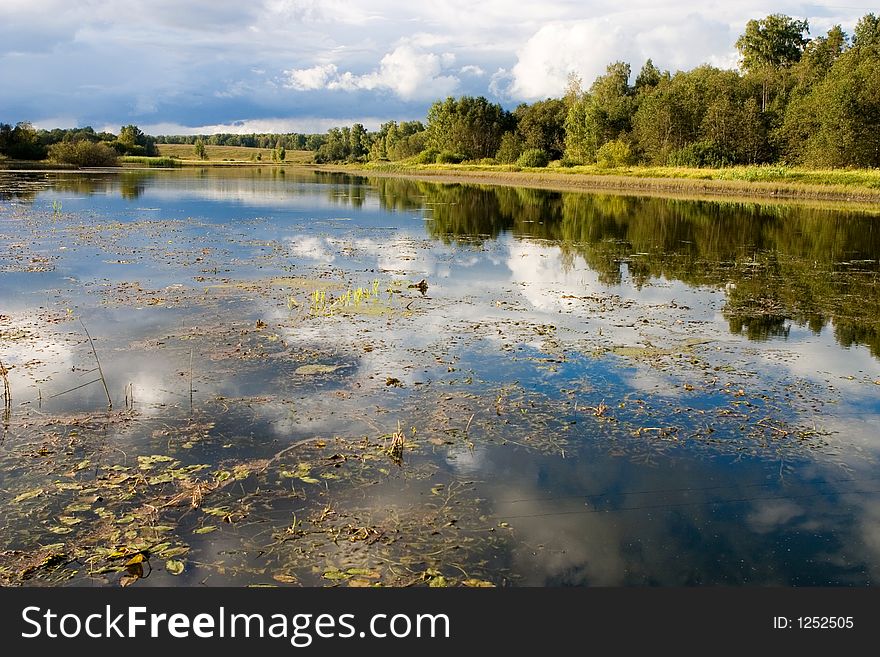 Reflections Of Clouds In The River