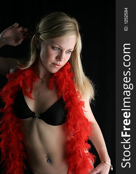 The beautiful blonde with a red boa