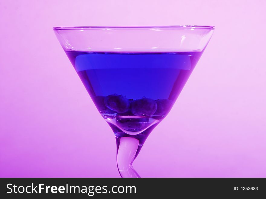 Blueberry Martini with blueberry dropped in