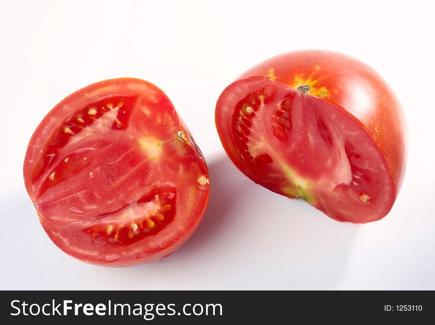 Cutted tomato over white background. Cutted tomato over white background