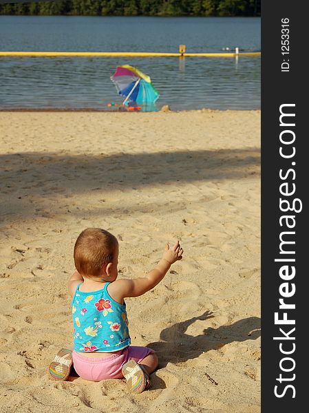 Baby On The Summer Beach