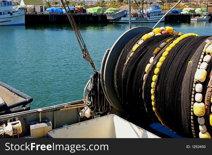 A fish net and ships