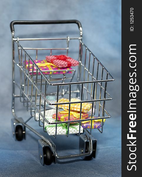 Photo of a Shopping Cart With Gift Boxes