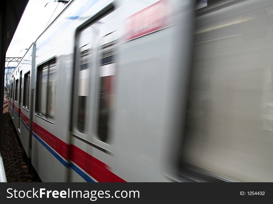 Train speed blurred, on track