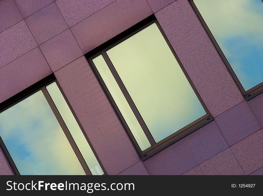 Reflection of the sky in the windows of a building. Reflection of the sky in the windows of a building