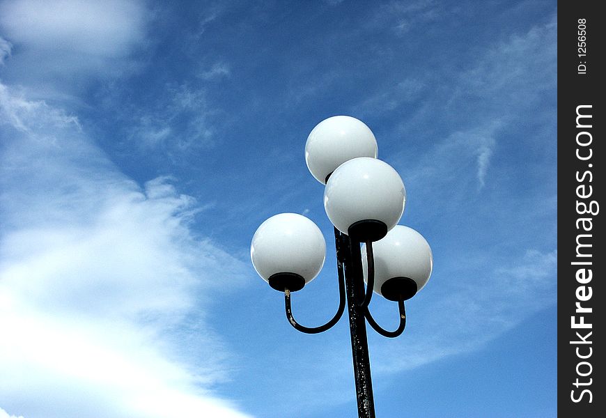 Detail of a lamppost from the bottom. Detail of a lamppost from the bottom