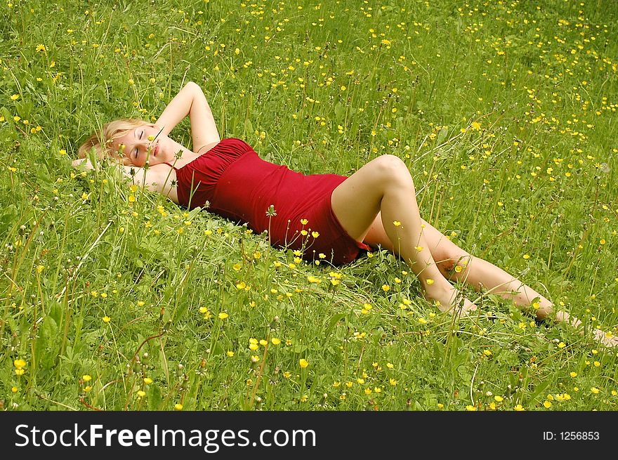 GIRL BETWEEN FLOWERS