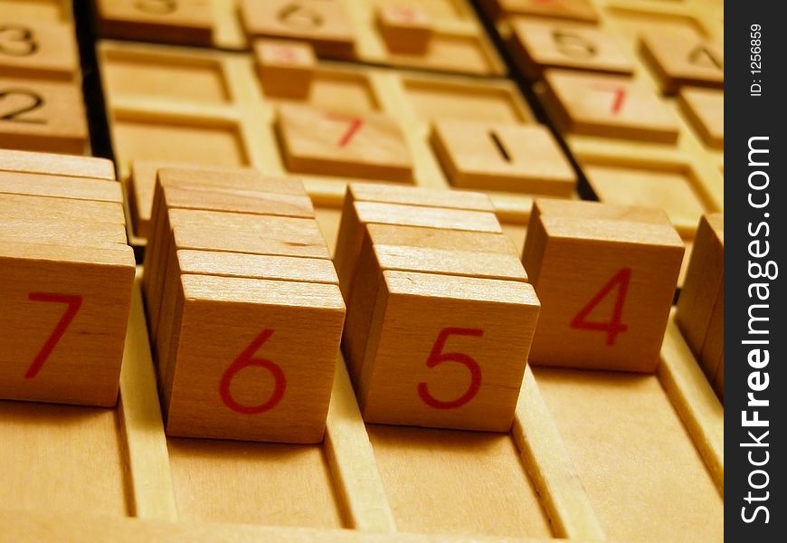 Wood sudoku board and tiles.