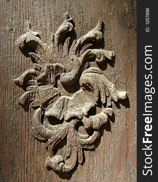 Carved detail on a wooden door, Szentendre Hungary. Carved detail on a wooden door, Szentendre Hungary.