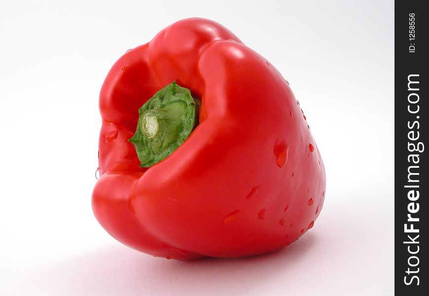 Fresh peppers on a white background