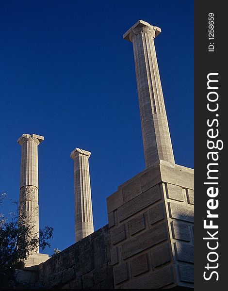 Pillars of Lindos Acropolis with blue sky