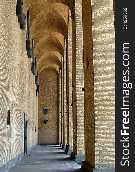 Looking between the wall and the pillars of the Konstmuseet in Göteborg. Looking between the wall and the pillars of the Konstmuseet in Göteborg.