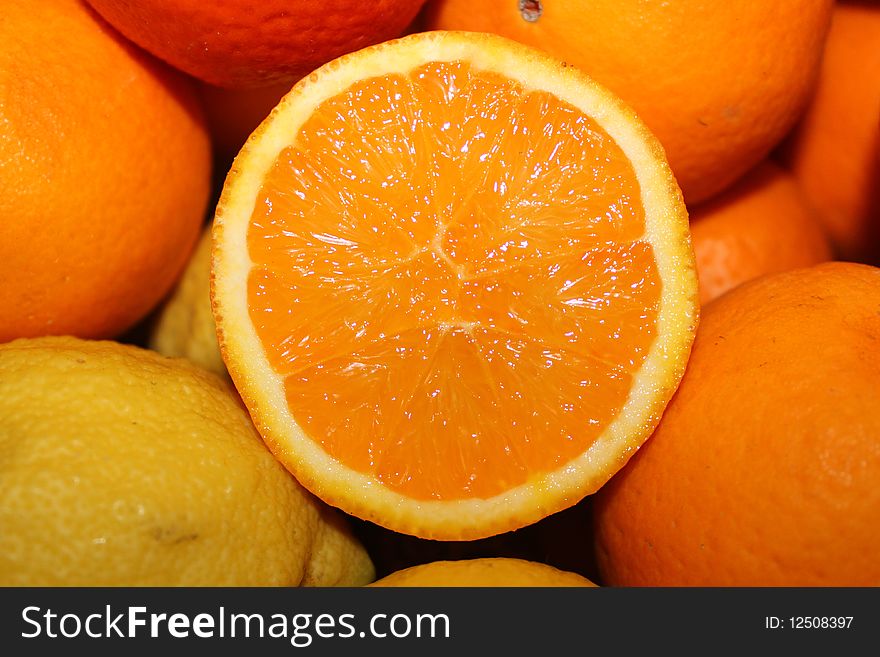 The photo of oranges and lemons
